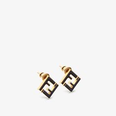 FF motif shaped earrings. Made of metal with a gold finish. Embellished with black enamelled details. Made in Italy. One Size Black Metal Earrings, Fendi Earrings, Fendi Jewelry, Ear Rings, Earrings Black, Metal Earrings, Black Enamel, Gold Finish, Black Metal