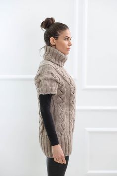 "Make a great first impression without saying a word with our soft wool turtleneck sweater vest . Crafted from high quality wool , that's comfortable and elegant at the same time, this design has a distinctive and stylish appeal. DETAILS - Made from 100% wool - The model is 170 cm tall (regular S) - The sweater on picture is size M-L with extended length - As mostly all models in our shop the sweater is loose fit - Color on photo - ligth brown FOR MORE For all our listings visit - https://www.et Winter Crew Neck Knit Sweater Vest, Winter Knit Sweater Vest, Beige Knitted Turtleneck Sweater, Cozy Hand-knitted Sweater Vest For Winter, Cozy Hand Knitted Sweater Vest For Winter, Hand Knitted Winter Sweater Vest, Fitted Hand Knitted Sweater Vest For Winter, Sweater Vest Vintage, Chunky Turtleneck Sweater