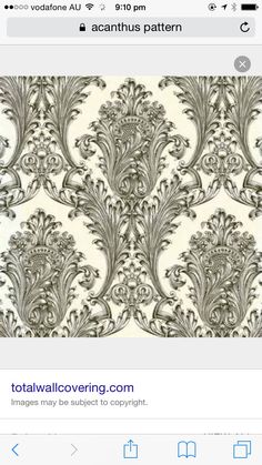 an old fashioned wallpaper pattern in grey and white with ornate design on the back