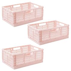 three pink plastic crates with handles and dividers on each side, one is empty