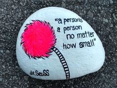 a rock with a pink flower painted on it that says,'a persons a person a matter no matter how small '