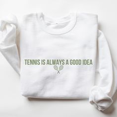 Tennis Sweatshirt I love to help my customers with custom orders! Please add you personalization request in the box when you check out or feel free to send me a message! I will get back to you promptly. Here is the link to my other tennis apparel & gifts: https://www.etsy.com/shop/ALittleSprinkl?ref=seller-platform-mcnav&section_id=47769910 This is a Gildan Sweatshirt with a UNISEX FIT. Please review the size chart in the images before you place your order. If you have any questions about sizing White Customizable Sweatshirt For Sports, Customizable White Sweatshirt For Sports, Sporty Crew Neck Sweatshirt With Custom Text, Customizable White Sweatshirt For Sports Events, White Custom Print Sweatshirt For Sports Events, Customizable White Crew Sweatshirt, Custom Text White Long Sleeve T-shirt, White Long Sleeve T-shirt With Custom Text, Tennis Sweater