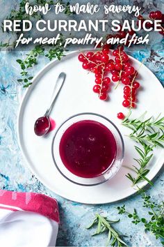 a plate with berries and a spoon on it