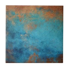 an abstract painting with blue and gold paint on it's edges, in the shape of a rectangle