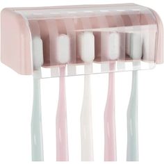 pink and white toothbrush holder with six different sized brushes hanging from it's sides