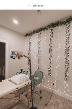 a room with lights and plants on the wall