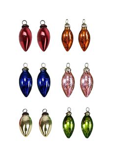 six different colored glass christmas ornaments on white background