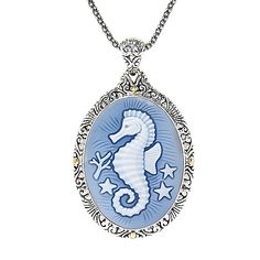 This beautifully intricate Samuel B. pendant boasts style that will set you soaring! Set in sterling silver  this pendant features an agate carved in your choice of a fine looking buddha  cat  moon  portrait  seahorse  turtle  butterfly  Virgin Mary or Jesus himself. All options boast a halo of textured scrollwork and 18K yellow gold accented halos as each swings from an included popcorn chain. Moon Portrait, Cat Moon, Virgin Mary, Gold Accents, Popcorn, Halo, Agate, Carving, Jesus