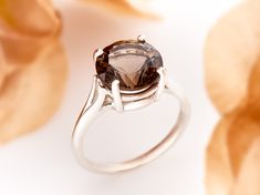 "Grade AAA, Fine Quality, Natural, large Smoky Quartz Solitaire Ring in premium silver ring setting. Beautiful color: medium to dark rich brown. Strong tone, and superior clarity (IF). These gemstones were cut to our specifications by a lapidary expert. The cut is Concave and nearly perfect. Material: 925 Premium Sterling Silver, U.S. Sizes: 5 - 10 ( 1/2 Increments) We used De-Ox silver for the heavy band and tray, which is cast in an oxygen-free environment - more shine, less tarnish. Primary G Brown Gemstone, Rubellite Tourmaline, Garnet Pendant, Ring Crafts, Handcrafted Rings, Ring Setting, Jewelry Cleaner, Amethyst Ring, Smoky Quartz