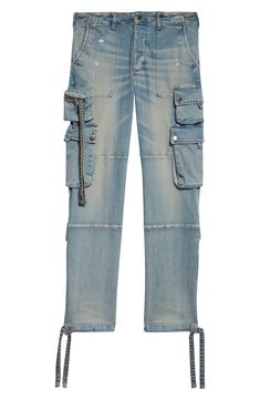 When it comes to combining beloved denim with the cargo comeback, Amiri completes the mission with pocket-popped jeans cut with plenty of stretch. 33 1/2" inseam; 15" leg opening; 11" front rise; 14" back rise (size 32) Button fly Front patch pockets; cargo snap-flap pockets; cargo zip pocket Drawstring hems 92% cotton, 6% elastomultiester, 2% elastane Dry clean Made in the USA Designer Clothing Urban Distressed Rigid Denim Cargo Jeans, Distressed Utility Cargo Jeans In Medium Wash, Distressed Straight Leg Utility Cargo Jeans, Utility Style Distressed Straight Leg Cargo Jeans, Distressed Medium Wash Utility Cargo Jeans, Utility Style Distressed Medium Wash Cargo Jeans, Utility Distressed Medium Wash Cargo Jeans, Distressed Utility Jeans, The Mission