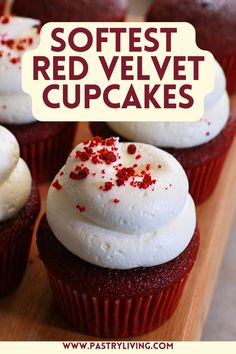 red velvet cupcakes with white frosting and sprinkles on top