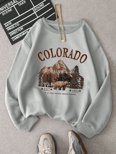 Stay warm and stylish with our Colorado Big Mounth Printed Cool Sweatshirts for women. Made with quality material. these sweatshirts feature a unique Colorado design that will make a statement wherever you go. Perfect for outdoor adventures or casual wear. stay comfortable and trendy with our sweatshirts. Cool Sweatshirts, Colorado Design, Big Mountain, Sweatshirts For Women, Mountain Print, Vintage Crewneck, Round Neck Sweatshirts, Oversize Hoodie, Grey Sweatshirt