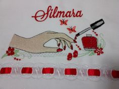 a white shirt with red trimmings and embroidered onto it that says, silimasa