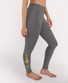 Embrace the Radiance of Positivity! Let the Flower Daydream Organic Cotton Leggings inspire your journey with their groovy floral design adorning each side cuff. Crafted from soft, organic cotton and designed for all-day comfort with a touch of stretch. To complete your boho-chic floral outfit, combine them with the Flower Daydream Organic Cropped Tank Top. These leggings come in a full-length style. Charcoal. Beautiful Boho Dresses, Sixties Dress, Cotton Sports Bra, Organic Cotton Leggings, Cotton Wrap Dress, Boho Clothes, Cotton Bralette, Tie Dye Tunics, Boho Boutique