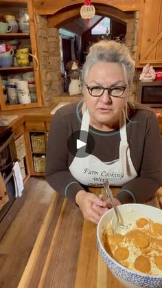 an older woman in glasses is making a bowl of food on the kitchen counter top