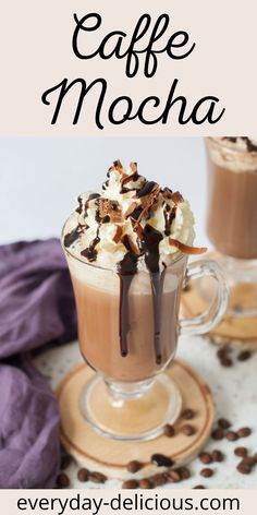 coffee mocha with whipped cream and chocolate toppings in a glass on a plate