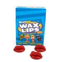 wax lips are sitting in front of a box