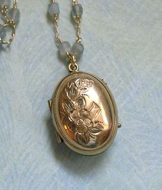 Antique Victorian Two Sided Locket Necklace With Etching, Antique Locket Necklace, Gift for Her A beautiful Victorian gold filled locket circa the late 1800's is the focus of this necklace.  This two sided locket has etching on both sides of flowers but the etching is unique on each side.  When you open the locket, both frames are inside along with their glass inserts with locks of hair on both sides.  The locket is suspended from a handmade 17 1/2" gold filled chain wire wrapped with square lab Victorian Hallmarked Antique Gold Locket Necklace, Heirloom Gold Locket Necklace With Antique Finish, Oval Locket From Vintage Jewelry Collection, Gold Heirloom Locket Necklace With Antique Finish, Antique Oval Pendant Jewelry With Antique Finish, Oval Locket For Vintage Jewelry Collection, Oval Locket Jewelry For Vintage Collection, Heirloom Hallmarked Locket Necklace For Anniversary, Gold Locket For Vintage Jewelry Collection