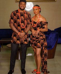 The Isiagu dress epitomizes African tradition, particularly for Igbo couples and attendees at African-themed events. This attire exudes regal charm and cultural significance, ideal for weddings and celebrations with its graceful silhouette and dramatic flair. Please note that the beads are original coral beads. Also "Everything +Nza + Fan" in the variation means everything that the couple is wearing including the clothes, beads, hand, Nza and hairpins.  For the best fit of this dress, kindly pro Igbo Beads For Ladies, Igbo Wedding Dress Nigerian Bride, Traditional Dresses For Couples, Igbo Men Traditional Wear, Igbo Traditional Attire, Igbo Traditional Wedding Attire, Igbo Attire, Nigerian Attire, Nigerian Traditional Wear