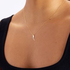 Diamond Angel Wing Pendant Necklace in 14K Gold Grow your own wings and fly in your own unique style. All of this is contained within a single necklace. Choose your own day and give your present in your own unique style. You'll have: 14k solid gold handcrafted pieces 100% US sourced jewelry Size Material: 14k Solid Gold Diamond Type: Natural Diamond Quality:Carat Weight: 0.01 ctwColor: F-GClarity: VS2Cut: Excellent Pendant Height: 17 mm / 0.67 in Pendant Width: 6 mm / 0.23 in Chain Style: Cable Single Necklace, Diamond Angel, Angel Wing Necklace, Angel Wing Pendant, Wing Necklace, Gold Diamond Necklace, Grow Your Own, Angel Wings, Cable Chain