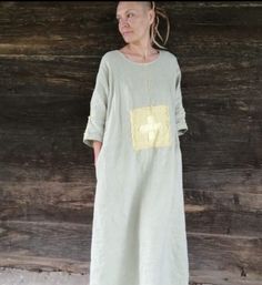 Traditional Linen Embroidered Dress For Summer, Traditional Embroidered Linen Dress For Summer, Linen Tunic Dress With Floral Embroidery, Bohemian Embroidered Linen Dress, Embroidered Linen Bohemian Dress, Green Linen Bohemian Dress, Spring Linen Dress With Natural Dye, Fitted Linen Bohemian Maxi Dress, Fitted Bohemian Linen Maxi Dress