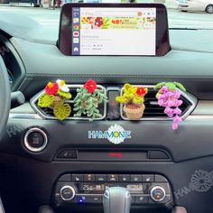 the dashboard of a car is decorated with fake flowers