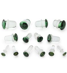 Single flare glass plugs with a hazy, swirling green and black design. Pick from sizes 8G - 1/2". Can be adjusted with clear "O" rings. Wearable area is about 12mm. Sold in pairs (2pcs). In Pairs, Green And Black, Black Design, O Ring, Swirl, Canning, Glass, Green, Black