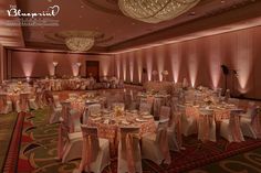 the banquet room is set up with tables and chairs for an elegant event or function