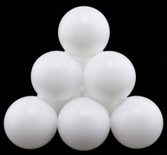 several white balls stacked on top of each other