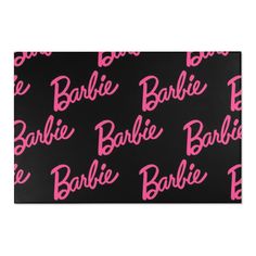 black and pink fabric with the word barbie on it in large letters that spell barbie's name