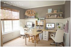 an image of a home office with two computer screens and desks on the same page