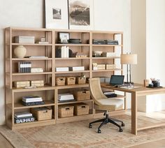 a home office with bookshelves, desk and chair