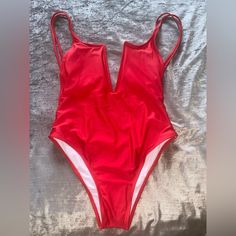 Cherry Red One Piece Swimsuit Red Lined Bodysuit For Pool, Red One-piece Swimsuit For Spring Pool Time, Red One-piece Swimsuit With Lined Body, Red Lined One-piece Swimsuit For Pool, Red Sleeveless Lined One Piece, Red One-piece Swimsuit For Poolside Spring, Red One-piece Swimsuit For Spring Poolside, Summer Red Bodysuit For Poolside, Red Bodysuit For Poolside Summer Events