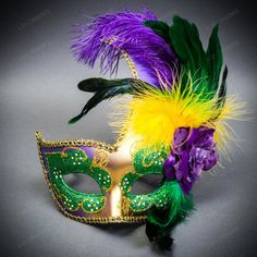 Product Description: Step Into A World Of Opulent Mystery With The Gold Venetian Half Moon Glitter Women's Masquerade Mask, Adorned With A Side Green Yellow Feather. This Mask Is A Masterpiece Of Elegance And Drama, Perfect For The Discerning Woman Who Wants To Make A Stunning Entrance At Any Masquerade Event. Crafted With A Delicate Half-Moon Shape, This Mask Sparkles In Gold Glitter, And Colorful Feather Casting A Radiant Glow That Beautifully Complements The Feminine Features. Its Design Is B Best Masquerade Mask, Mardi Gras Mask Painting, Green Mask For Masquerade Carnival, Green Masks For Masquerade Carnival, Green Masks For Carnival Masquerade, Green Masquerade Mask For Mardi Gras, Green Masquerade Mask For Mardi Gras Party, Green Masks For Mardi Gras Carnival, Mardi Gras Costume Masquerade Mask