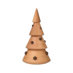 a wooden christmas tree with dots on the bottom and brown spots on the top, sitting in front of a white background