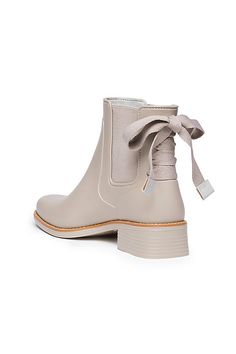 Briton Rainboots by Bernardo in White, Women's, Size: 11, Polyester/Rubber at Anthropologie Spring Waterproof Ankle Boots, Waterproof Ankle-high Boots For Spring, Winter Ankle Rain Boots With Lug Sole, Waterproof Lace-up Spring Boots, Waterproof Lace-up Boots For Spring, Fall Ankle Rain Boots With Lug Sole, Beige Waterproof Boots For Fall, Pack Your Bags, New Love