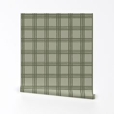 a green and white plaid pattern wallpaper on a white background with room for text