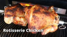 two chickens are being cooked on an outdoor grill with the words rotisseie chicken