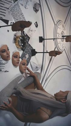 there are many mannequins on display in the room with mirrors and clocks