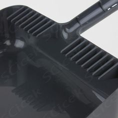 a close up view of a black plastic object