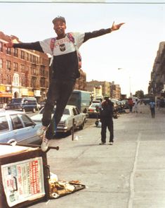 a man on a skateboard doing a trick in the air