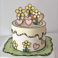 a cake with flowers and hearts on it