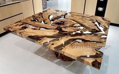 the table is made out of wood and has an unusual design on it's surface