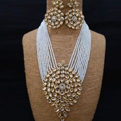 Gold Rodium Polish White and Off White color Necklace in Metal Alloy studded with Kundan, Pearl Luxury White 22k Gold Kundan Necklace, Luxury 22k Gold White Kundan Necklace, Maroon Necklace, Violet Necklace, Engagement Reception, Reception Lehenga, Color Necklace, Metal Necklace, White Necklace