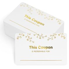 two white business cards with gold foil on them