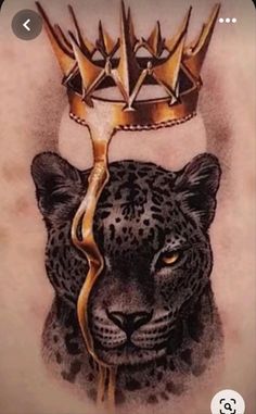 a black and white tattoo with a crown on top of a leopard's head