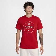 No matter your sport, stand with your country in this USA tee. Heavyweight cotton fabric has a stiff drape and structured feel. Nike University Red Crew Neck T-shirt, Cotton Sports T-shirt With Flag Print, Red Crew Neck T-shirt With Flag Print, Red Graphic Tee With American Flag Print, Sporty Cotton T-shirt With Flag Print, Red American Flag Graphic Tee, Red American Flag Print Graphic Tee, Red Short Sleeve Tops Made In Usa, Red Cotton T-shirt With Flag Print