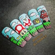 Manicura : Ideas de diseños de uñas de Super Mario Bros #Uñas #Manicura #Nails #SuperMario #MarioBros #Supermariobros Theme Nail Art Designs, Character Design Nail Art, Cartoon Nails Art, Nail Art Characters, Nail Cartoon Art, Mario Nail Art, Cartoon Nail Art Designs, Cartoon Character Nails, Pixar Nails