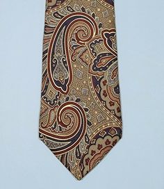 Formal Multicolor Paisley Suit And Tie Accessories, Elegant Multicolor Paisley Print Suit And Tie Accessories, Fitted Patterned Standard Tie, Patterned Fitted Standard Tie, Elegant Patterned Ties With Paisley Print, Blue Paisley Print Business Ties, Classic Paisley Print Patterned Ties, Luxury Elegant Paisley Print Ties, Elegant Multicolor Paisley Print Ties