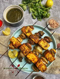 grilled tofu on skewers with dipping sauces